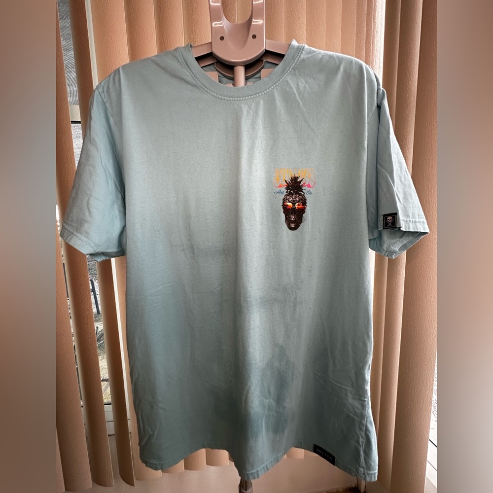 Aqua Graphic Tee with Artistic Design